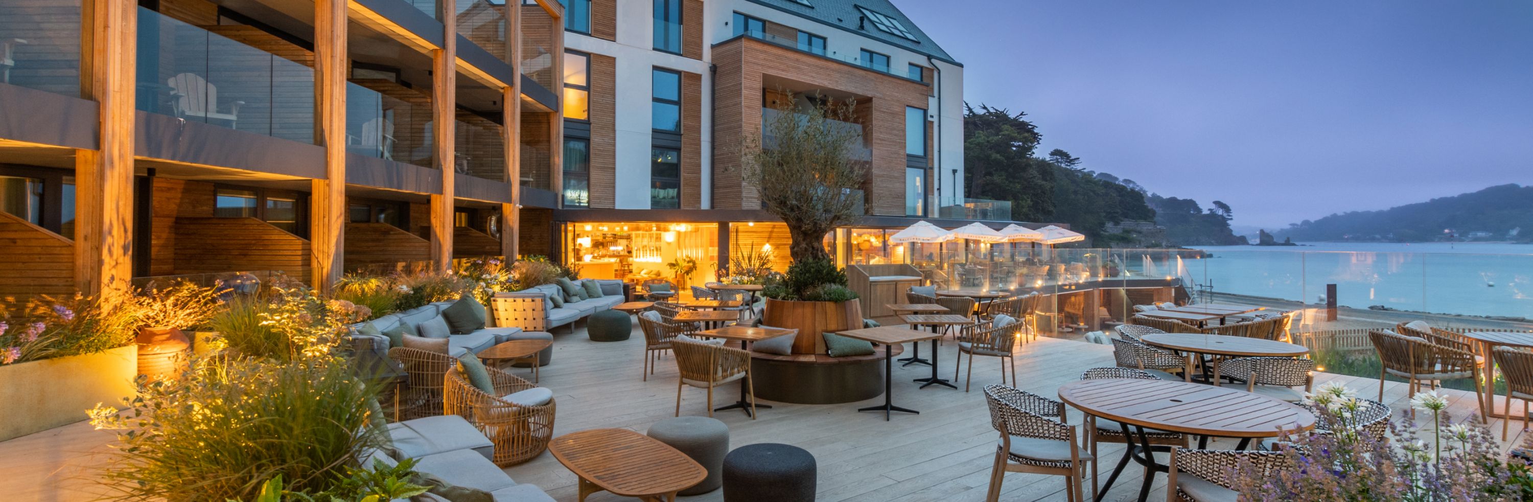 Harbour hotel balcony with seating at night