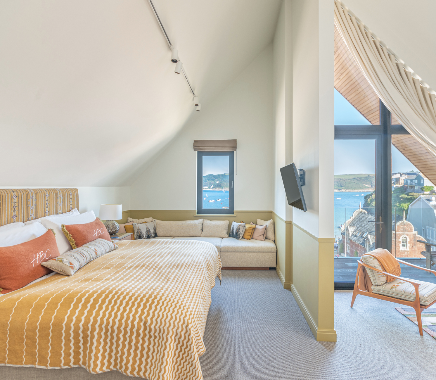 Harbour hotel room with bed and sofa